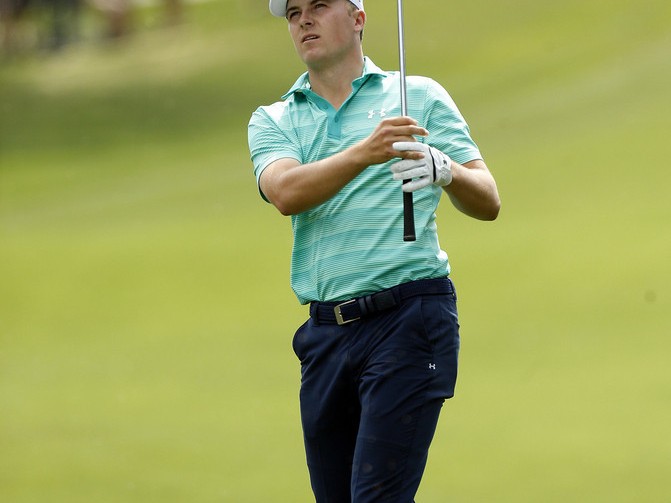 绿茵之上冰火交响大师镜头下的高尔夫搏击瞬间